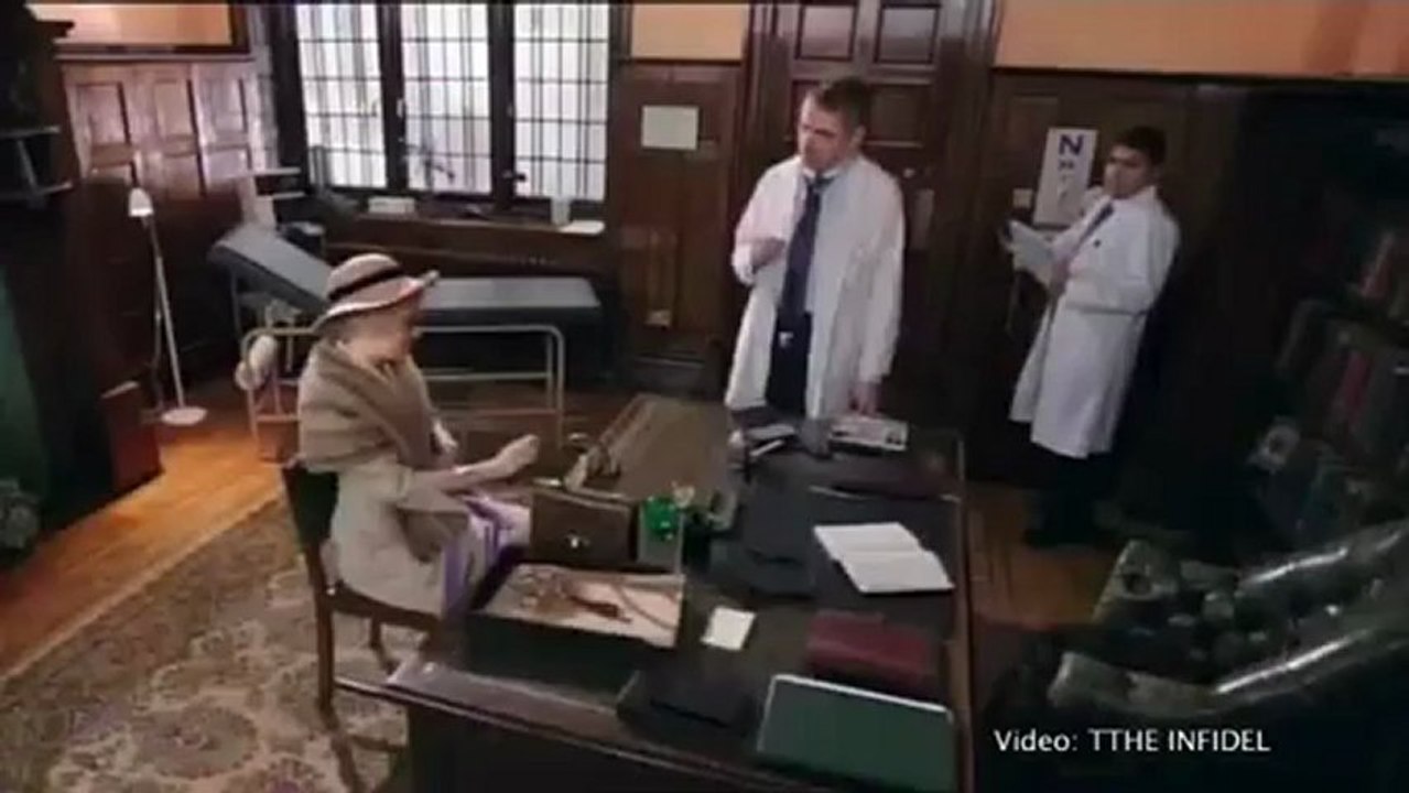 Rowan Atkinson gives Pixie Lott a full body examination.