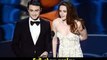 Actor Daniel Radcliffe and actress Kristen Stewart present onstage Oscar Awards 2013