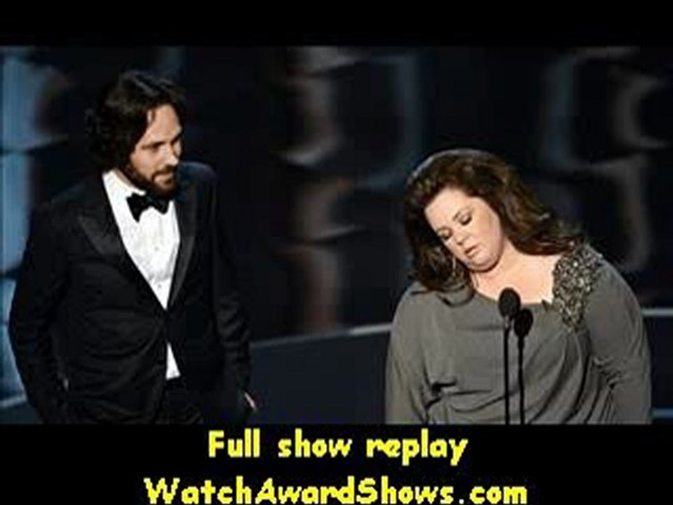 Paul Rudd and Melissa McCarthy present onstage Oscar Awards 2013