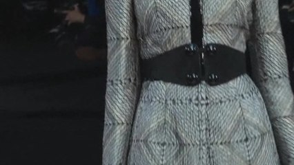 Giorgio Armani shows sleek, masculine silhouettes in Milan.