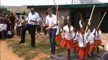 Prince Harry dancing with children on Africa charity visit