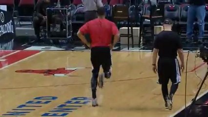 Derrick Rose calentando antes del partido