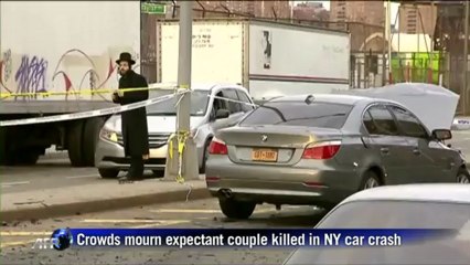 Crowds mourn expectant couple killed in Brooklyn