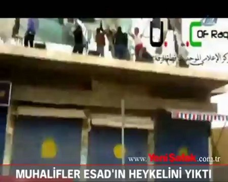 Muhalifler Esad'ın heykelini yıktı