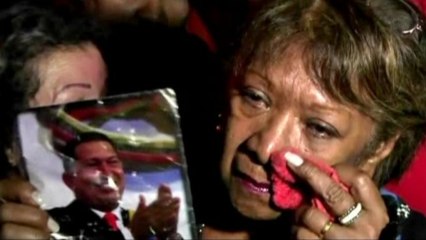 Venezuelans sob openly over Chavez's death