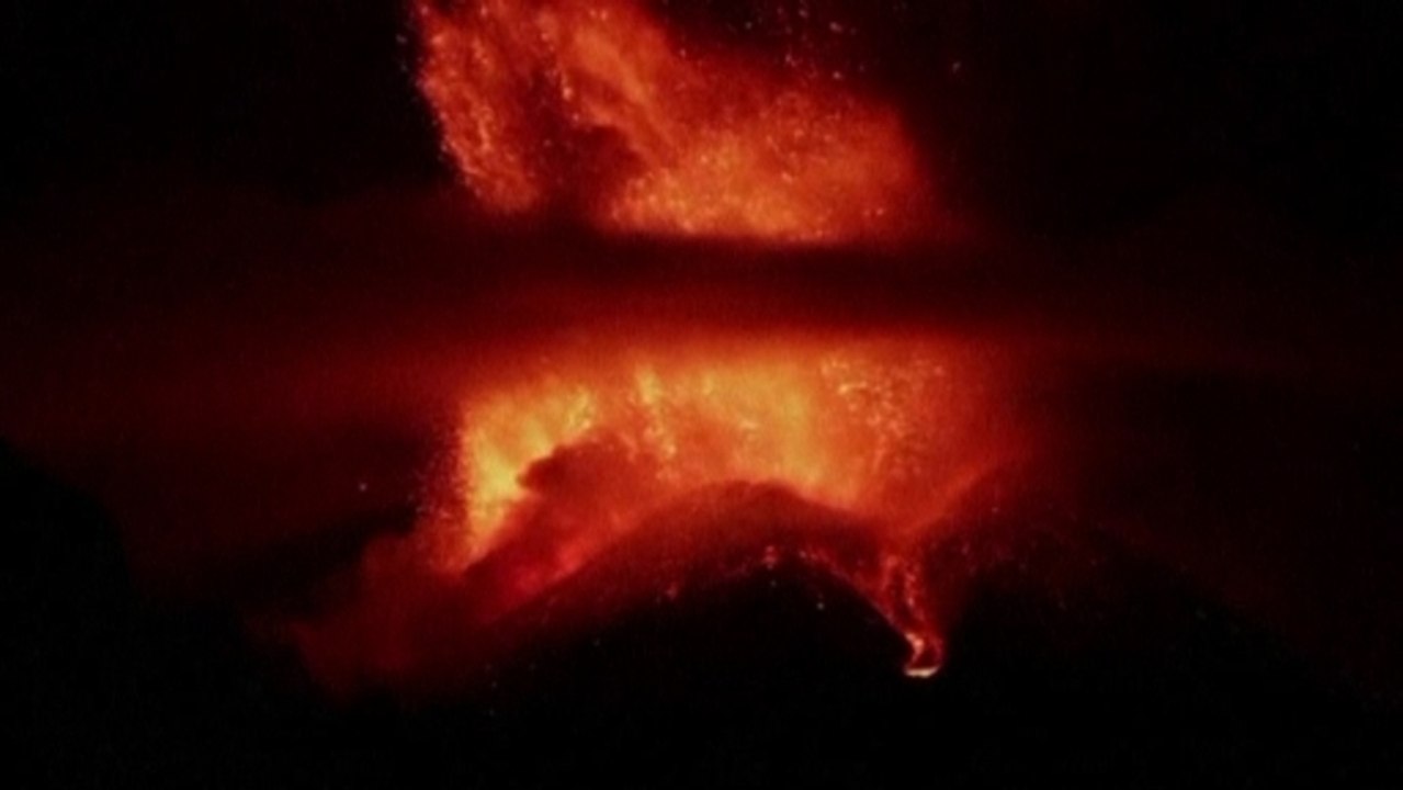 Italy's Mount Etna spews lava