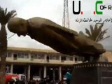 Raw: Syrian rebels tear down Assad family statue