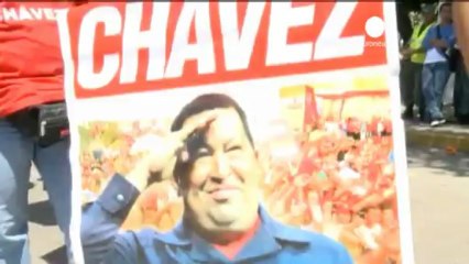 Devoted 'chavistas' flood to Caracas