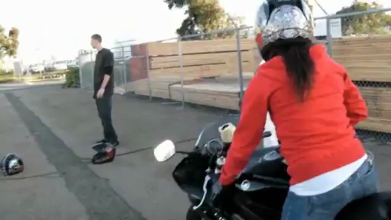 Hot girl does motorcycle stunt (HD)