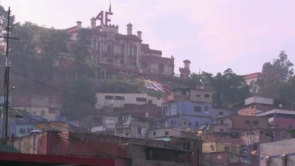 Venezuelans proud to have Chavez's body in district