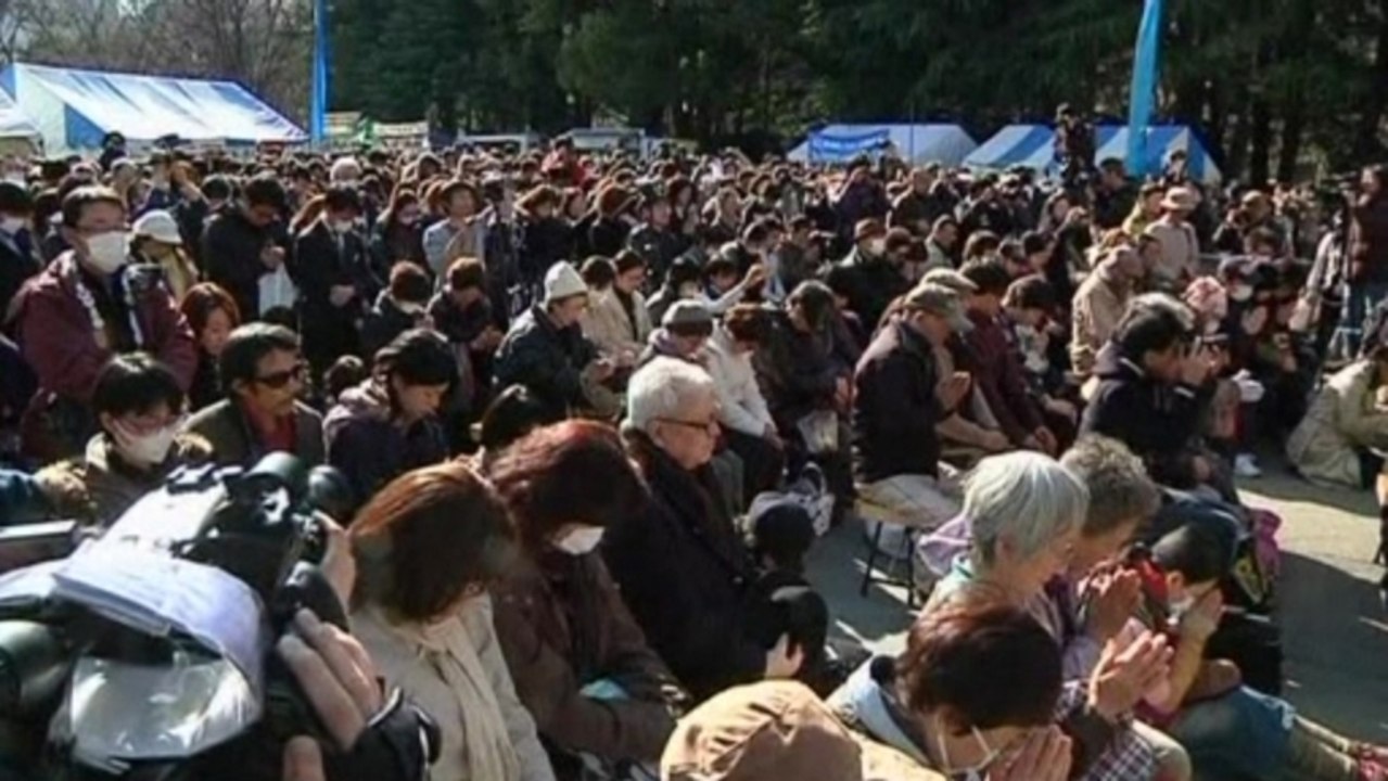 Japanese hold moment of silence on disaster anniversary