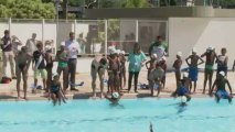 Michael Phelps joins young swimmers from favela on visit to Rio
