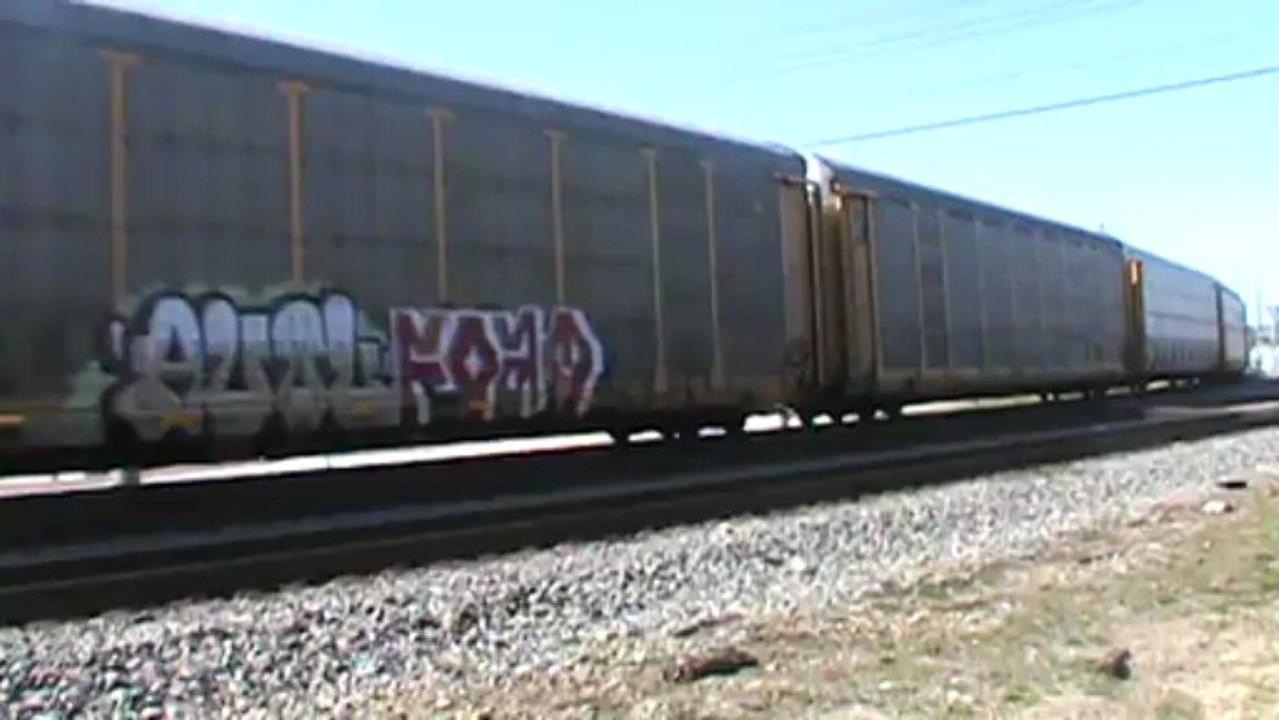 Norfolk Southern autorack and stack train east through Austell Ga.