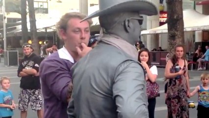 Guy Pesters Human Statue And Pays For It