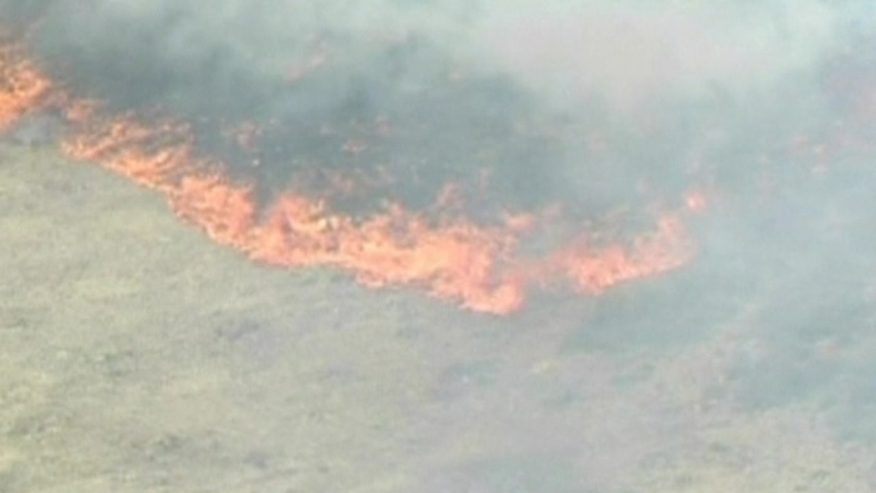 Wildfires rip through mile-high state