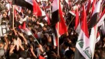 Iraqi supporters of Shiite cleric al-Sadr rally in show of strength