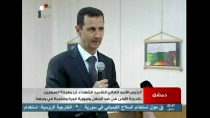 Syria's Assad recognizes dead children and students in ceremony