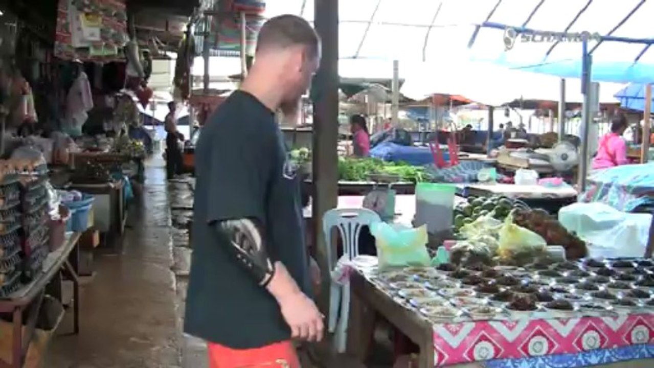 Laos - Getting Fishing Baits at the Fresh Market - Never Stop Riding