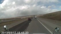 Wind blows a truck over...