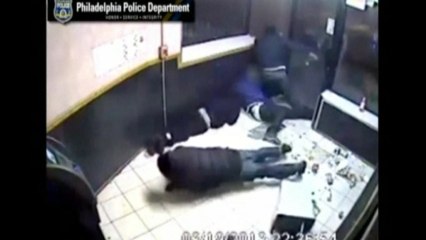 Video captures gunman firing into Philadelphia store
