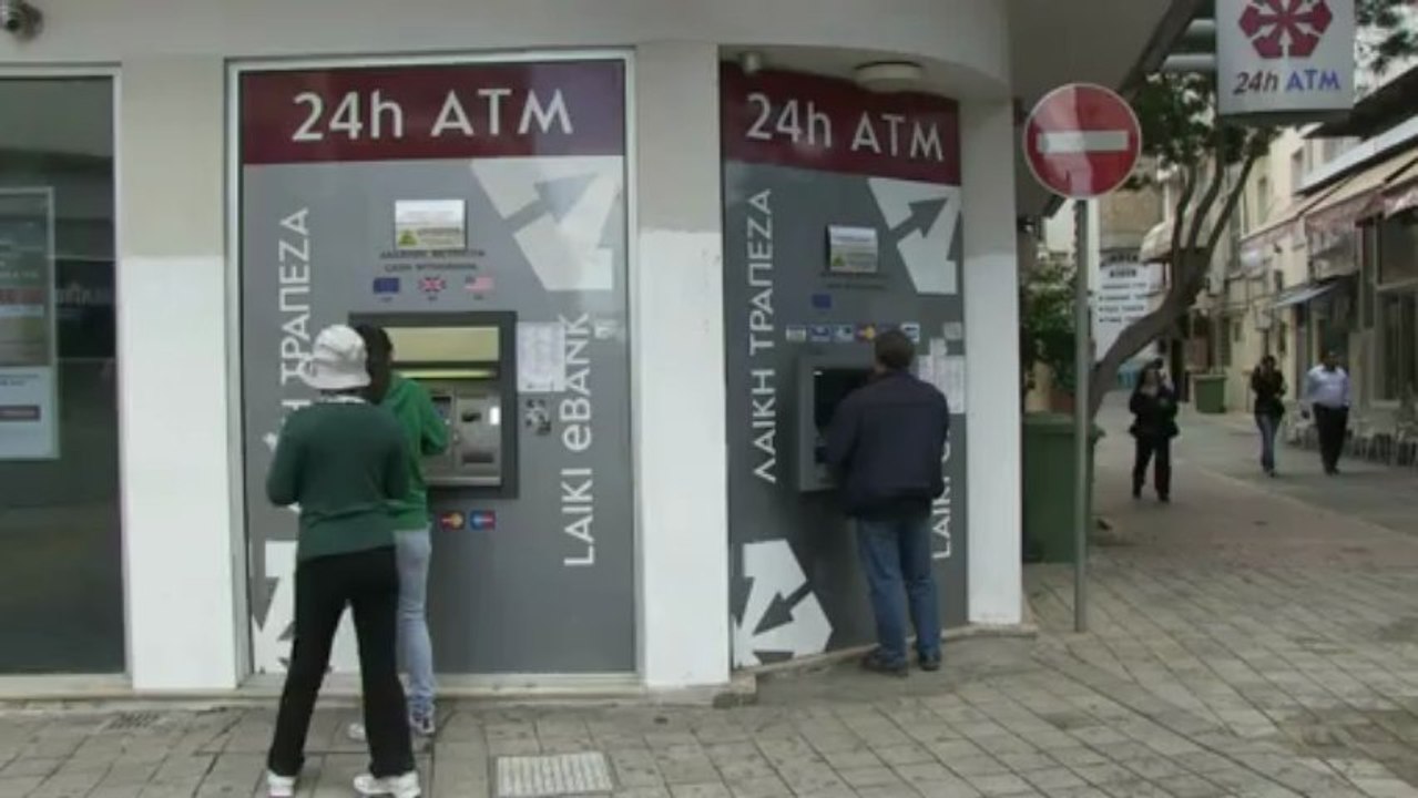 Cypriots divided over bailout measures