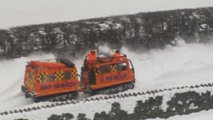 Vehicles stranded in UK snowdrift