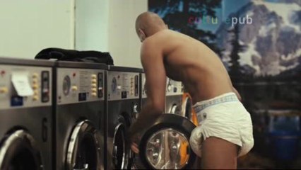 Hunky black man strips down... to diaper
