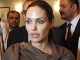 AP ShowBiz Minute: Jolie, Cranston, DVF Awards