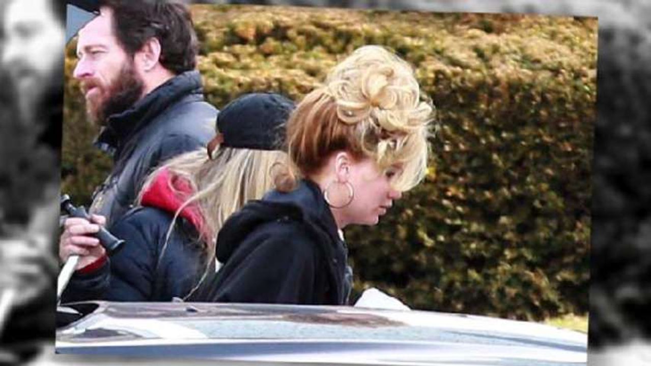 Jennifer Lawrence Sports 70's Hairstyle