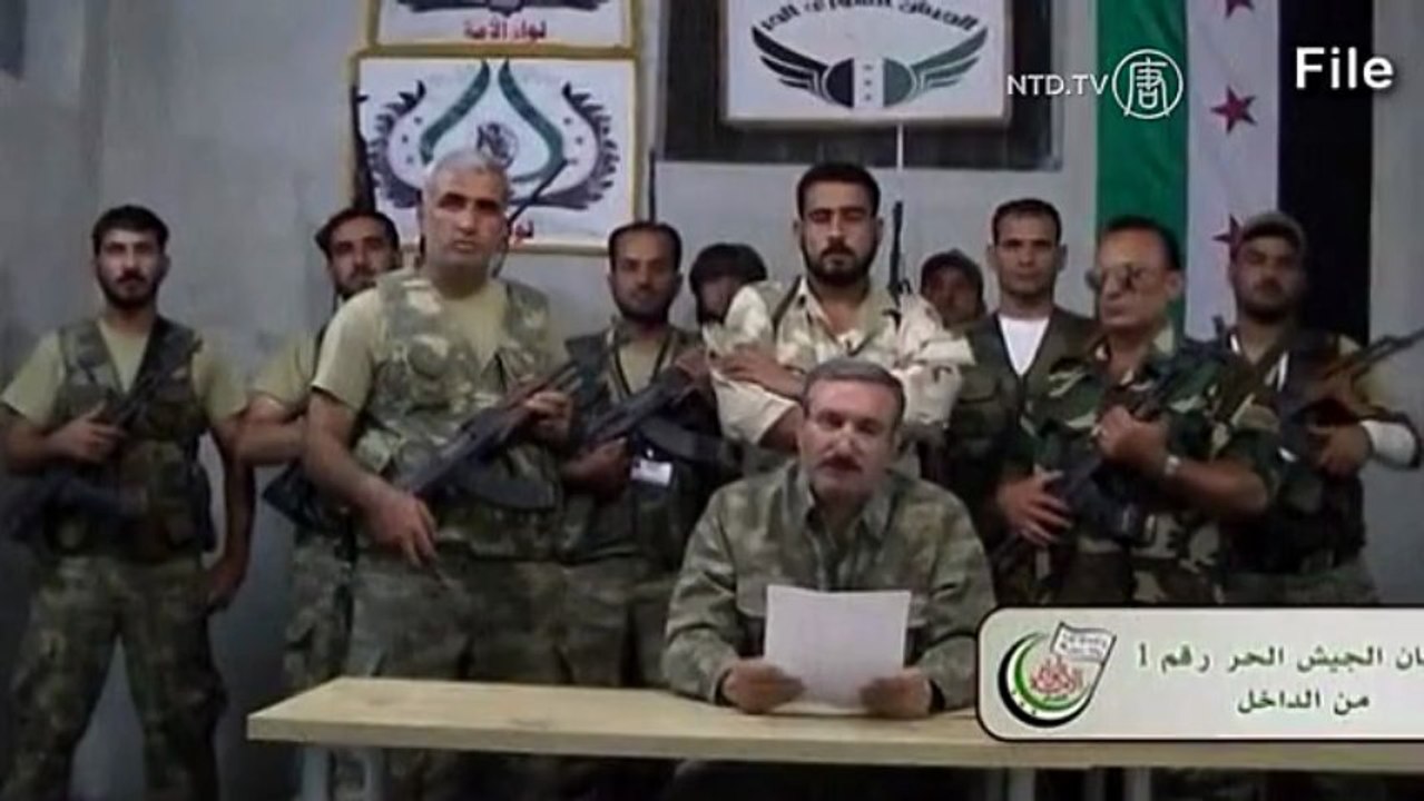 FSA leader loses leg in explosion