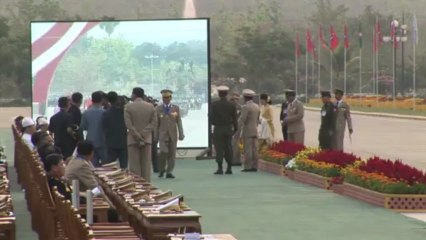 Suu Kyi makes symbolic debut at Myanmar army parade