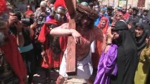 Christian pilgrims follow the Way of the Cross
