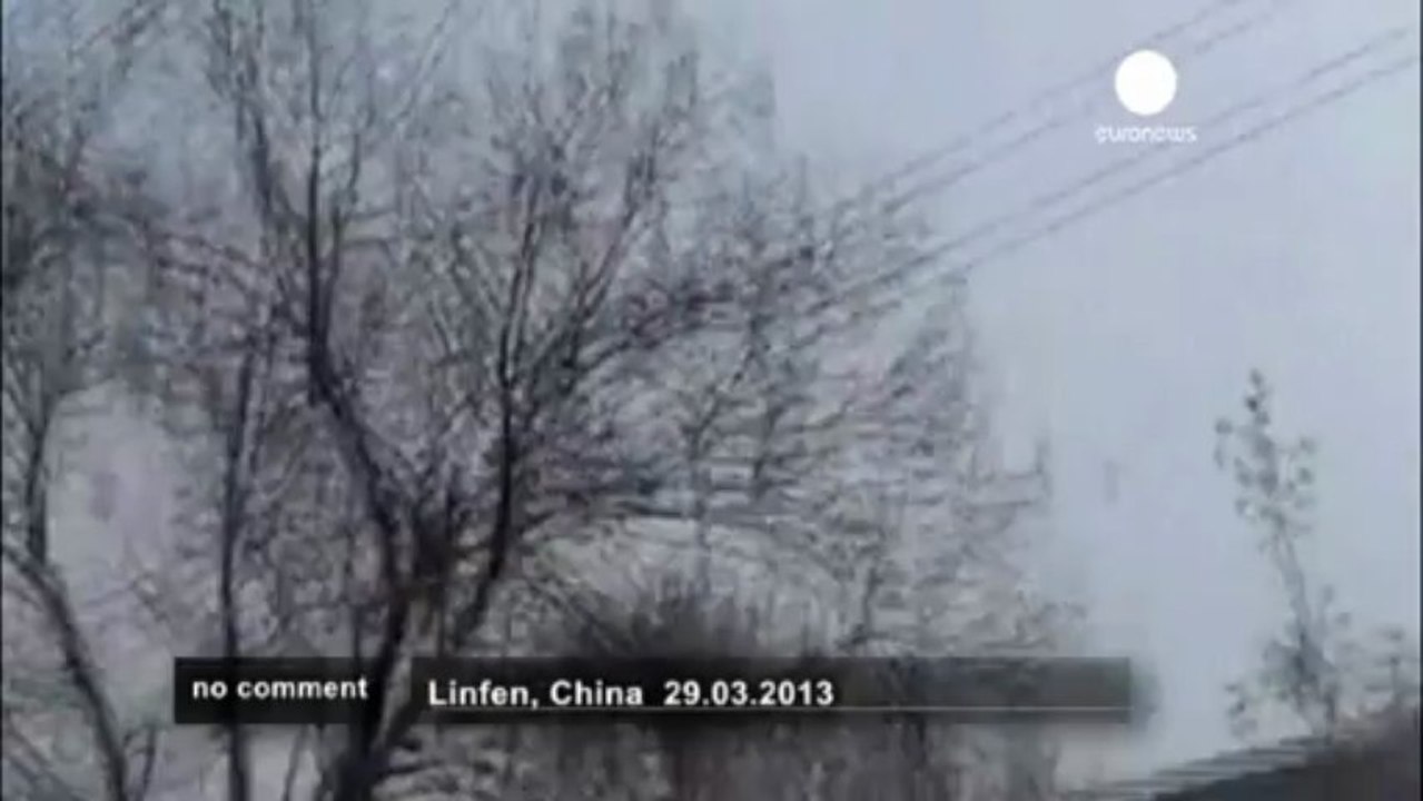 Drunk Chinese man climbs telephone wires - no comment