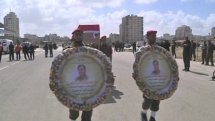 Palestinians bury dead youth, prisoner