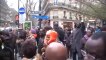 Willy Bla devant le siège du Parti socialiste français lors de la 5 ème marche de soutien à Gbagbo