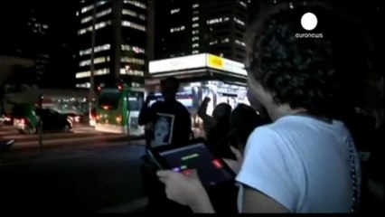 Brazilians play Pac-Man in Sao Paulo