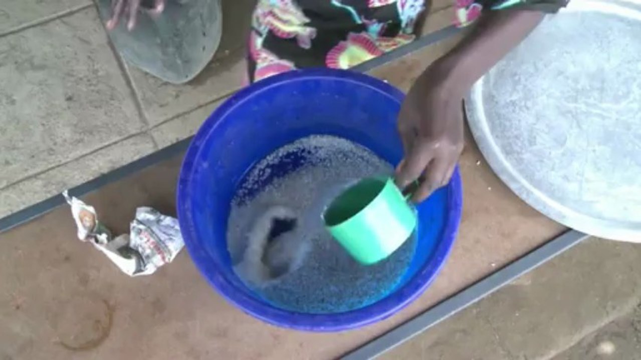 Trash-burning stove helps clean up African village