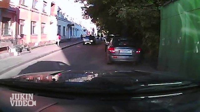 Crazed Man Kicks Windshield