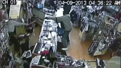 FULL: Chicago Store Owner Fights Off Robber with Baseball Bat