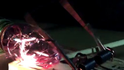 Rat trap in slow motion meets light bulb