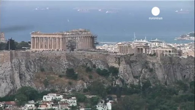Greece reaches bailout deal, Portugal offers new austerity
