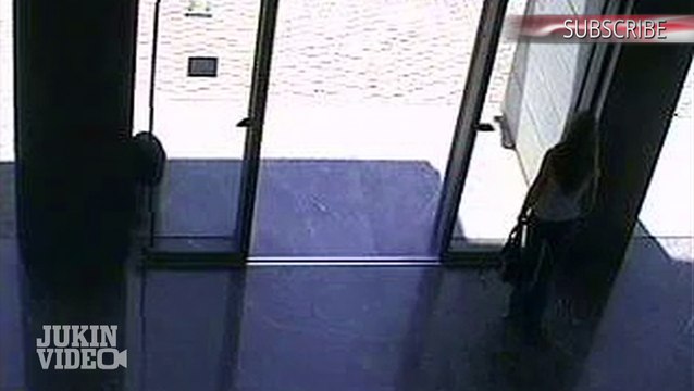 CWE3572 Security Camera Girl Walks into Sliding Door FVA