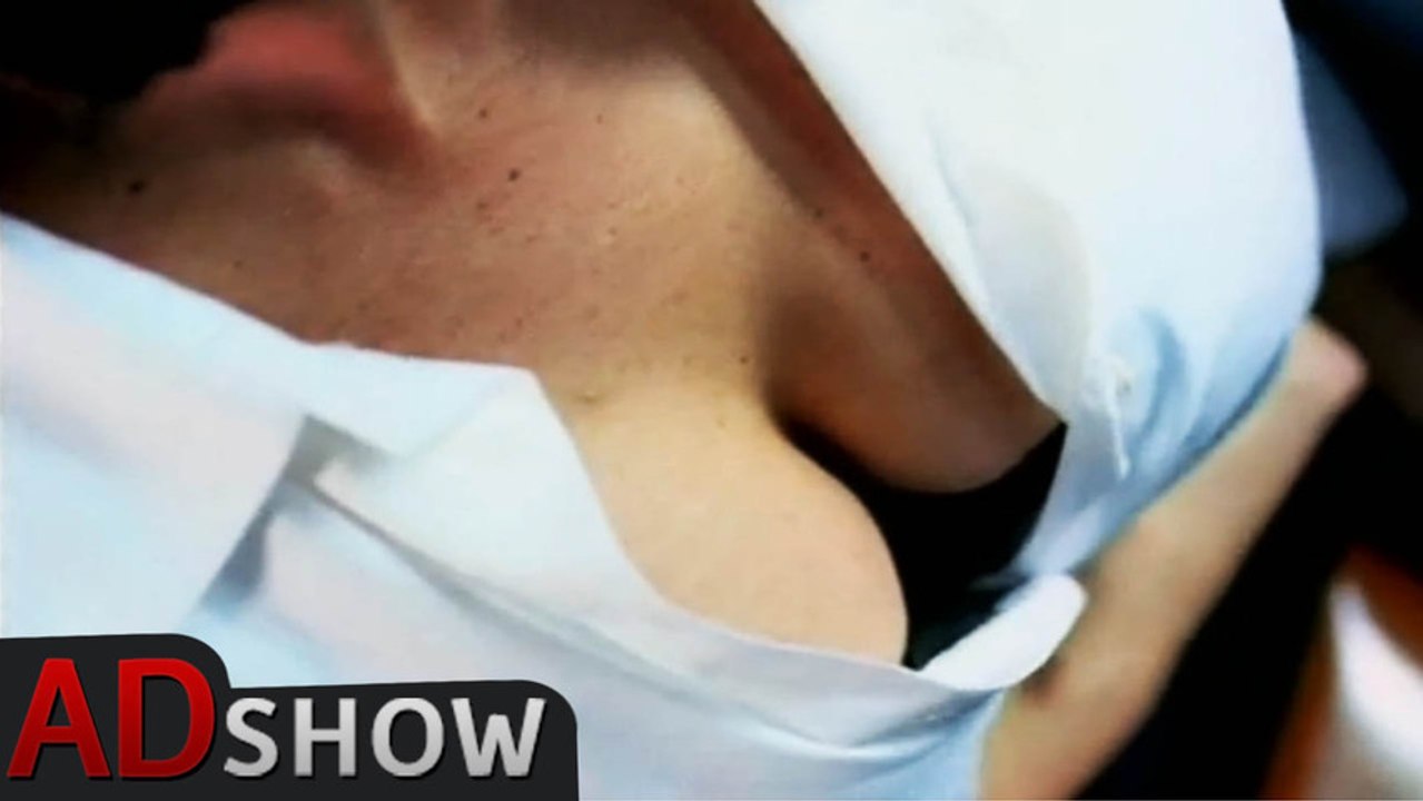 Busty brunette gives bus passenger a show