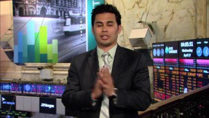 Dow dips on earnings, commodity drop