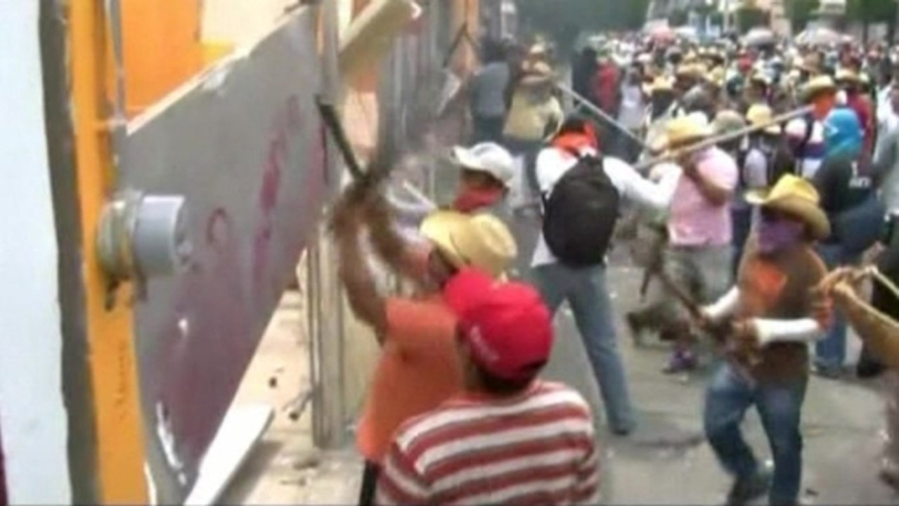 Mexico teachers attack political party offices