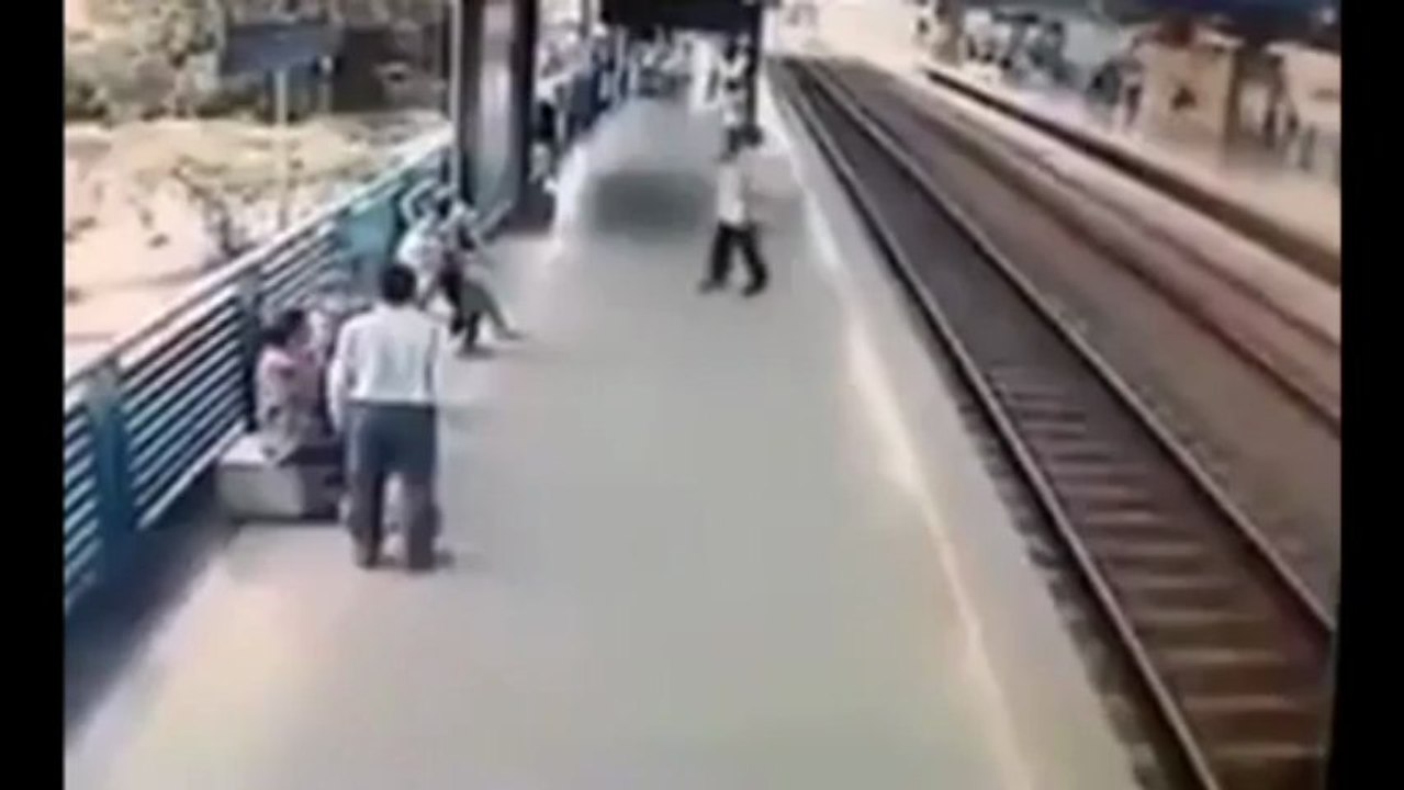 Police Save Suicidal Man From Train