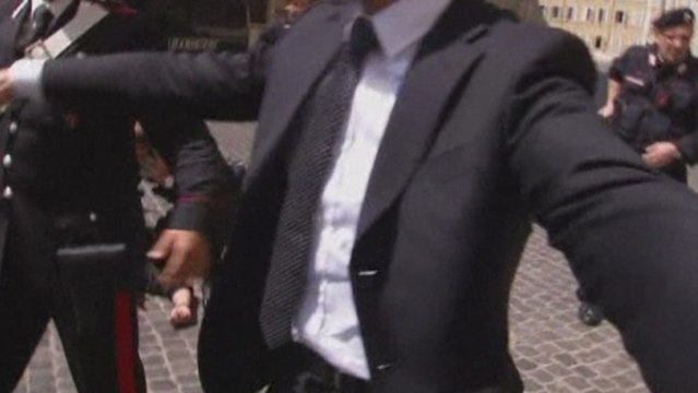 Two Italian police wounded in shooting near PMs office