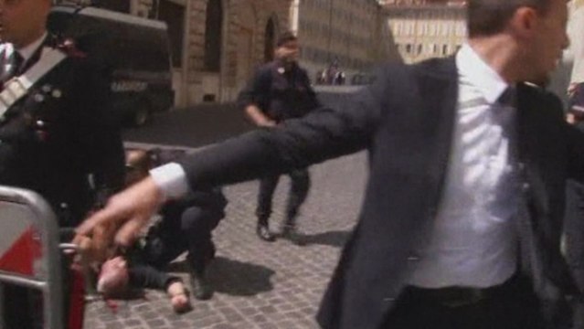 Two Italian police wounded in shooting near PMs office