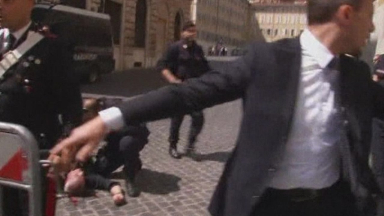 Two Italian police wounded in shooting near PMs office