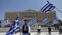 Greece parliament approves job cuts